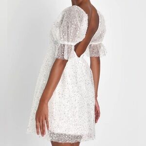 White sequence and pearl dress